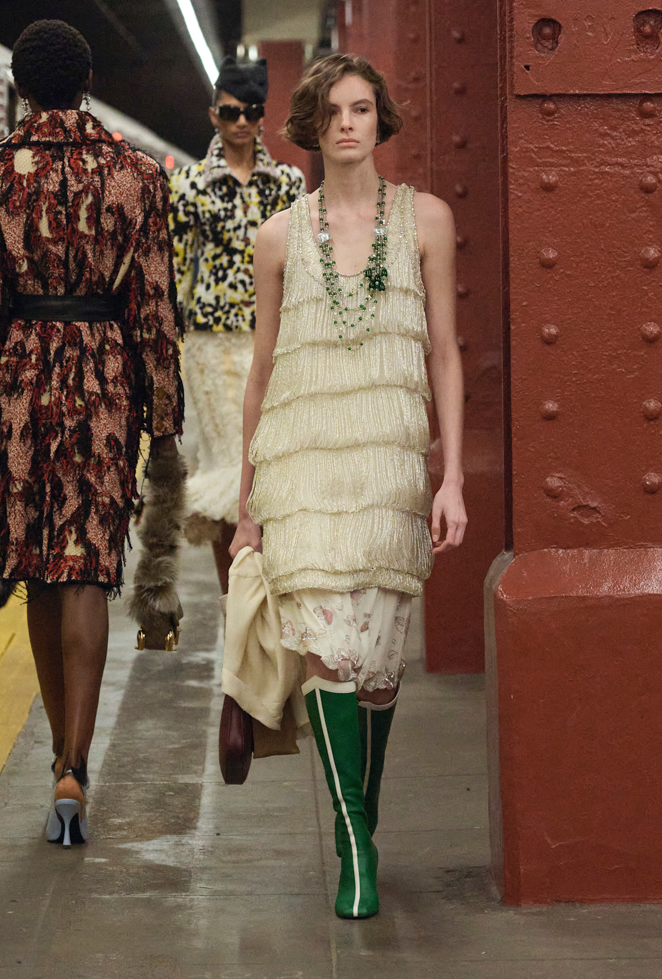 models walk the subway runway for the chanel metiers d'art 2026 show in new york city