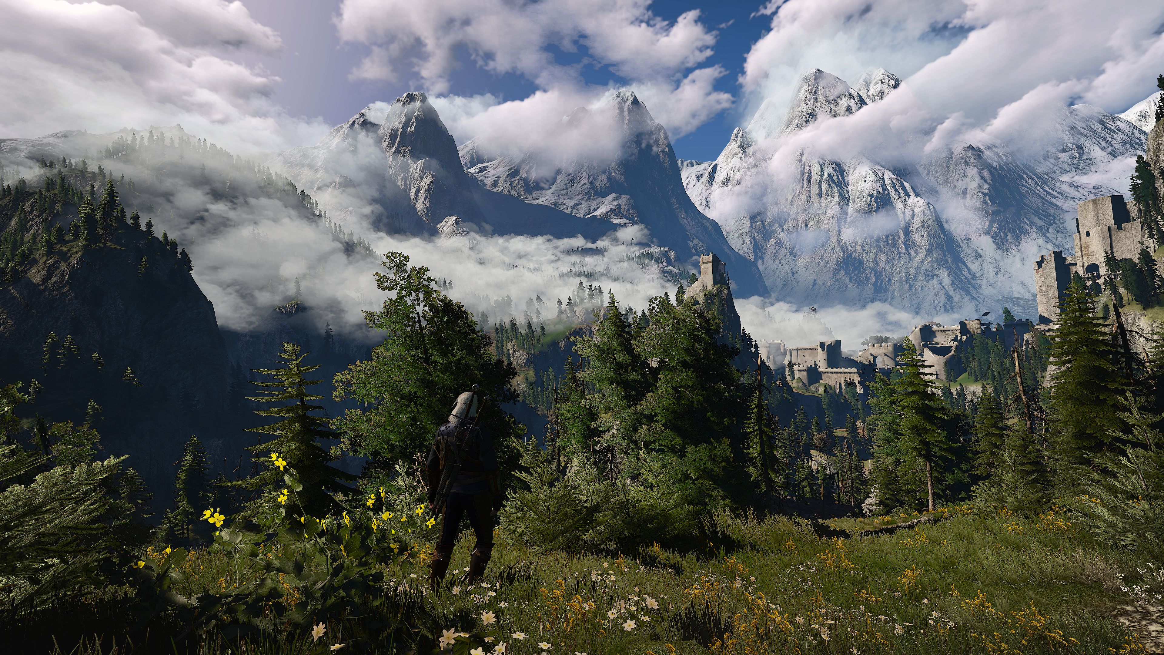 Geralt surveys the mountains around Kaer Morhen