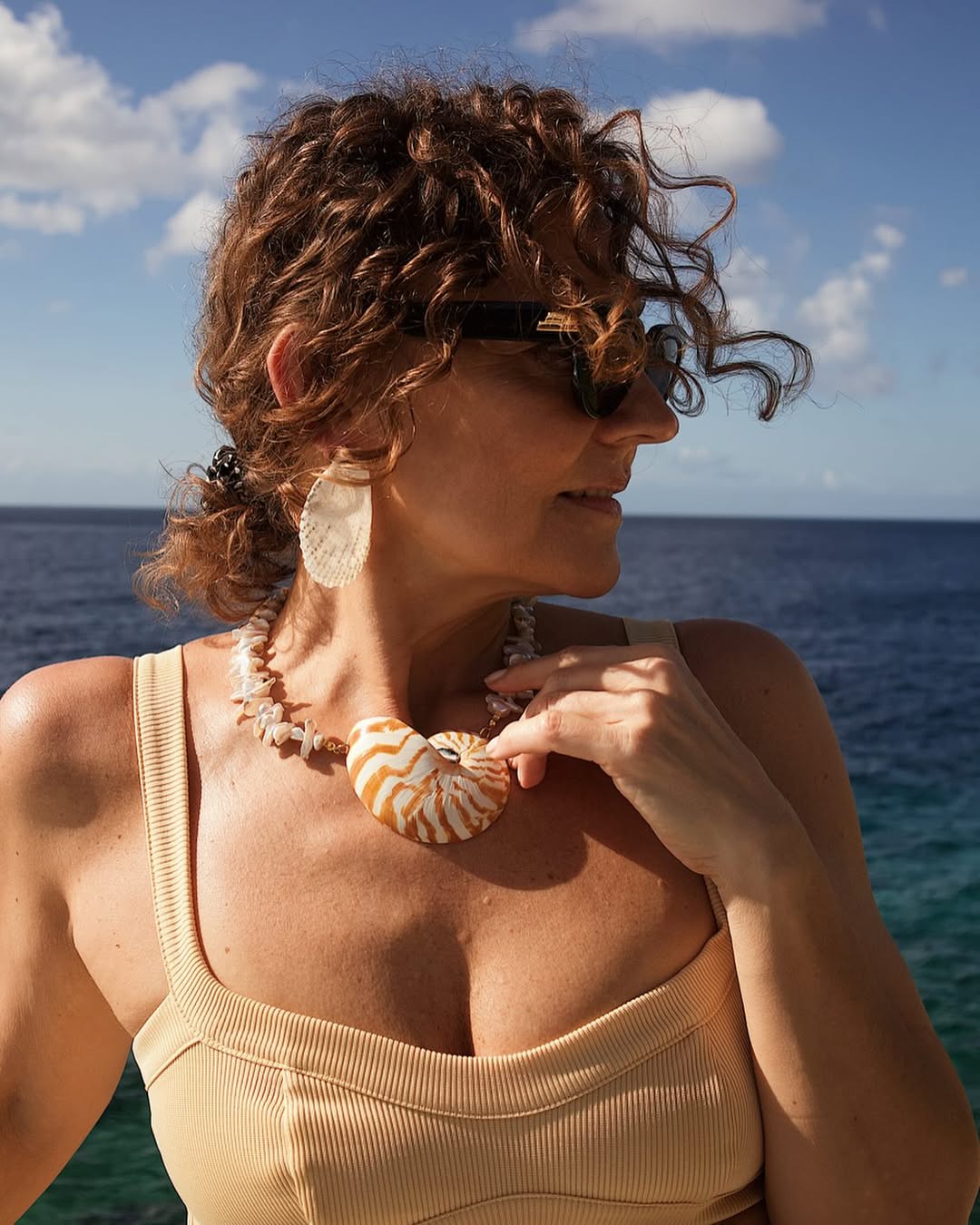 Renia wearing shell jewellery