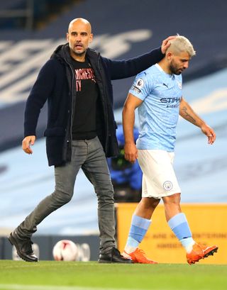 Pep Guardiola and Sergio Aguero File Photo