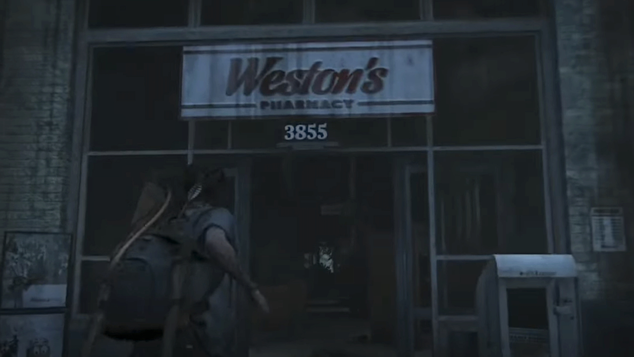 Ellie approaching the doors to Weston's Pharmacy in The Last of Us 2