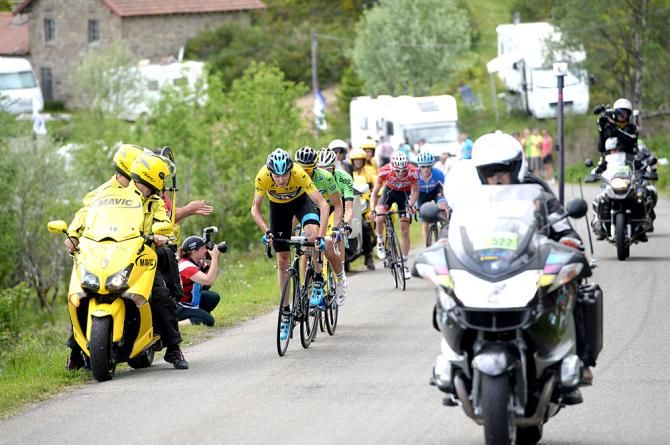 Chris Froome (Team Sky) makes his move to win the second stage of Criterium du Dauphine