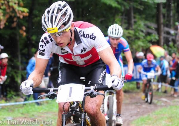 Nino Schurter (Switzerland) is caught by Jaroslav Kulhavy