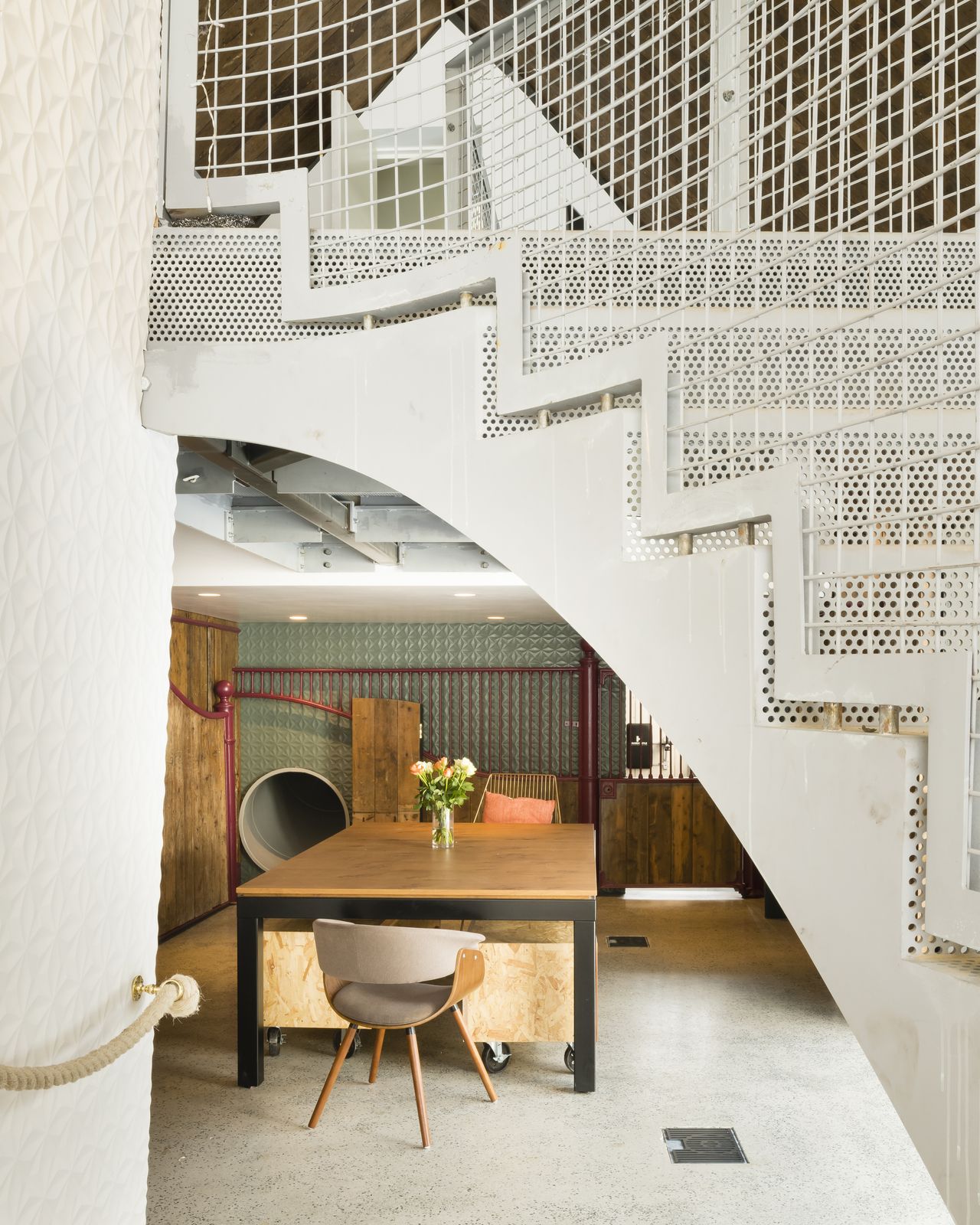 dining are of extension with a slide and steel stairs