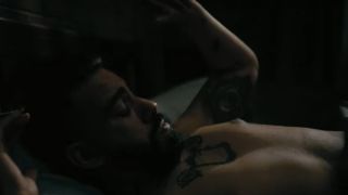 Leo with a Lasser Glass tattoo in The Fall of the House of Usher