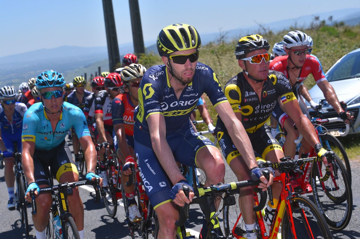 Damien Howson (Orica-Scott) sitting in the peloton