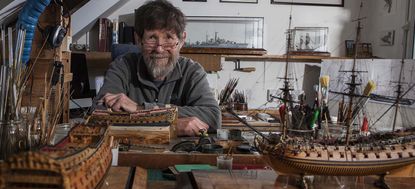 Model ship maker Philip Reed at his workshop above his house in Truro, Cornwall. © Richard Cannon / Country Life Picture Library