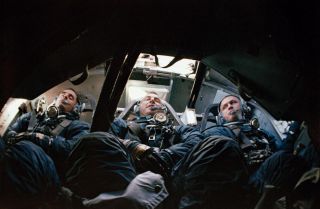 Astronauts William A. Anders, James A. Lovell Jr., and Frank Borman, (left to right) are seen inside Apollo Boilerplate 1102A during water egress training in the Gulf of Mexico. Borman is Apollo 8 commander; with Lovell serving as command module pilot; and Anders as lunar module pilot