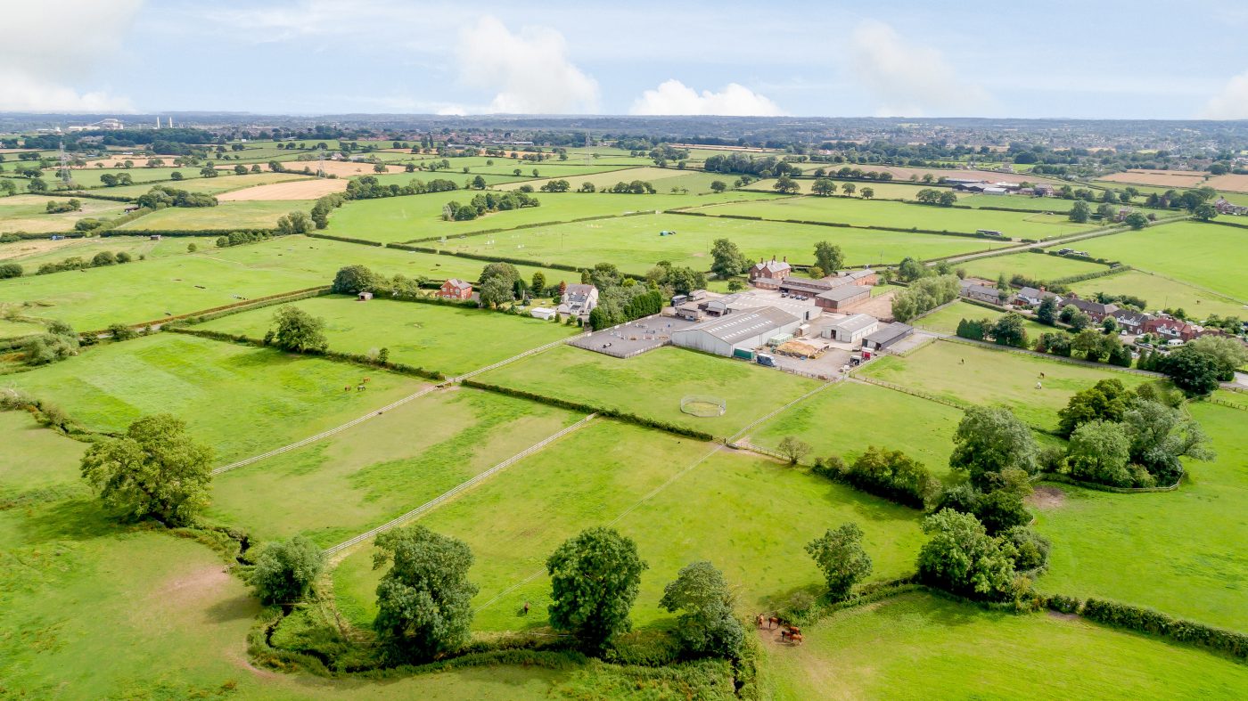 Crumleigh-Heath-Farm-aerial-distance-shot-e1568107722640.jpg