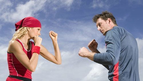 man and woman sparring