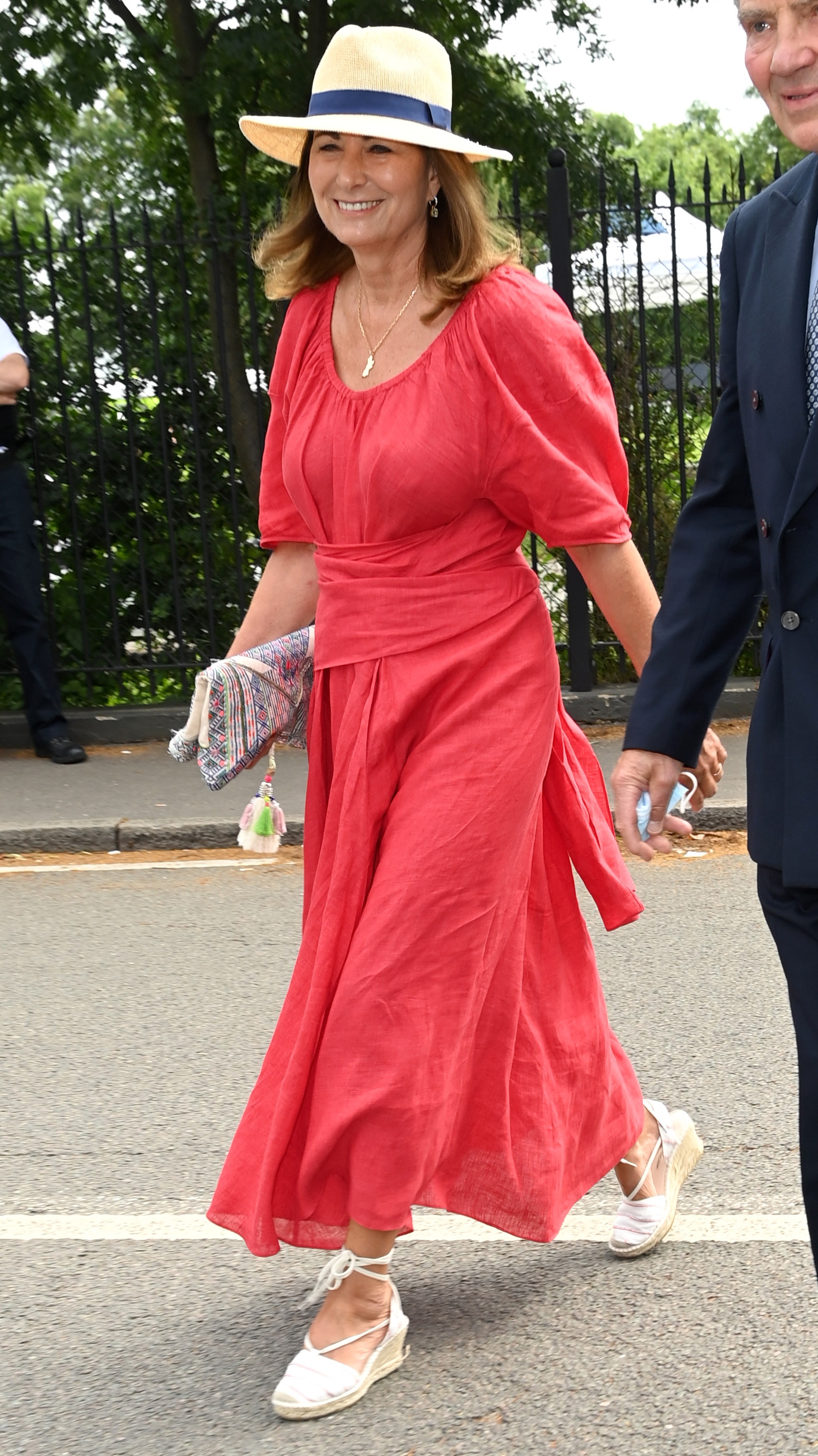Carole Middleton walks to attend day 11 of the Wimbledon Tennis Championships at the All England Lawn Tennis and Croquet Club on July 09, 2021