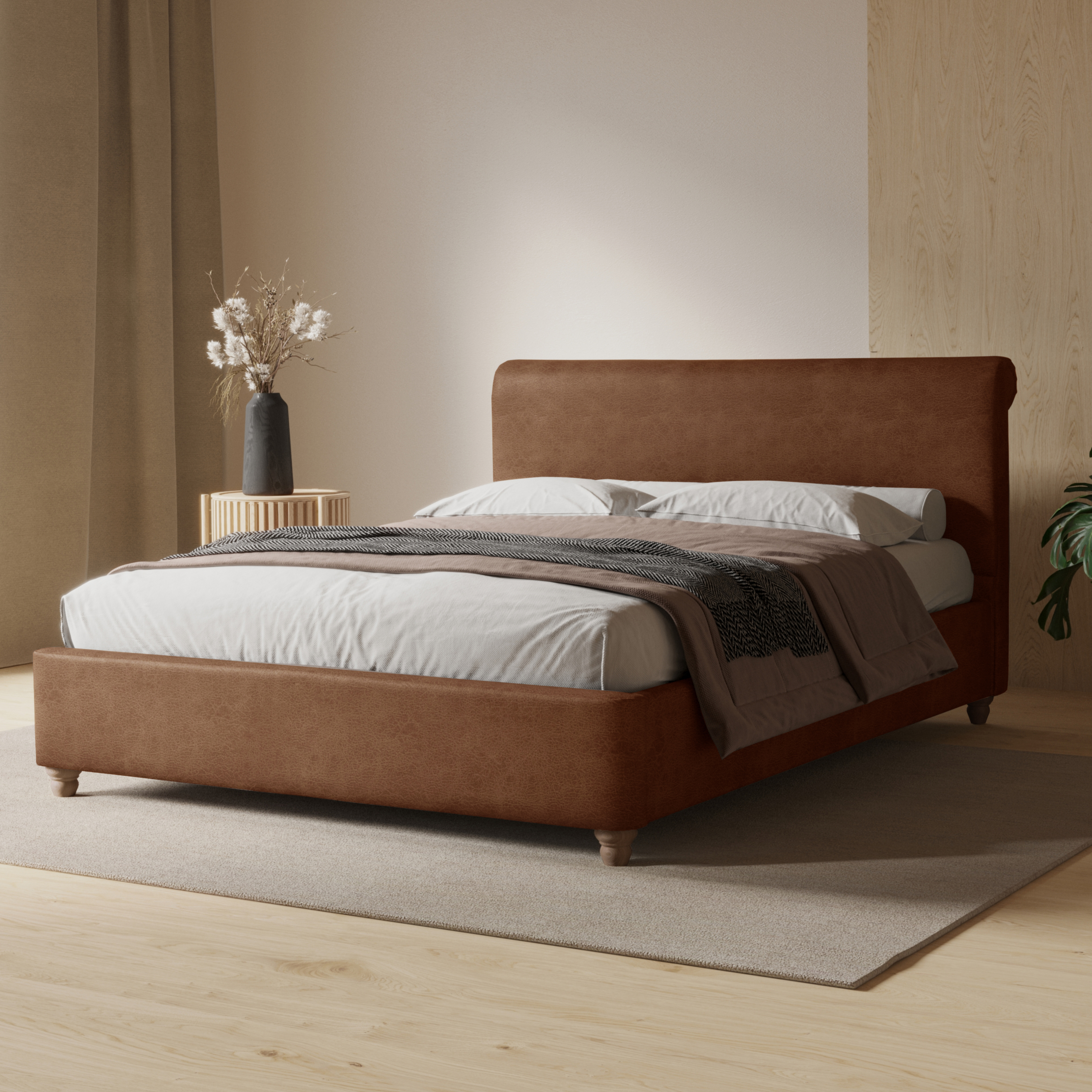 Brown leather-effect classic ottoman bed in a pale beige room with light wood flooring