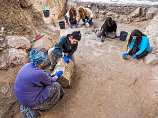 Archaeologists and high-school students participating in the dig uncovered architectural elements including this marble pillar base decorated with crosses.