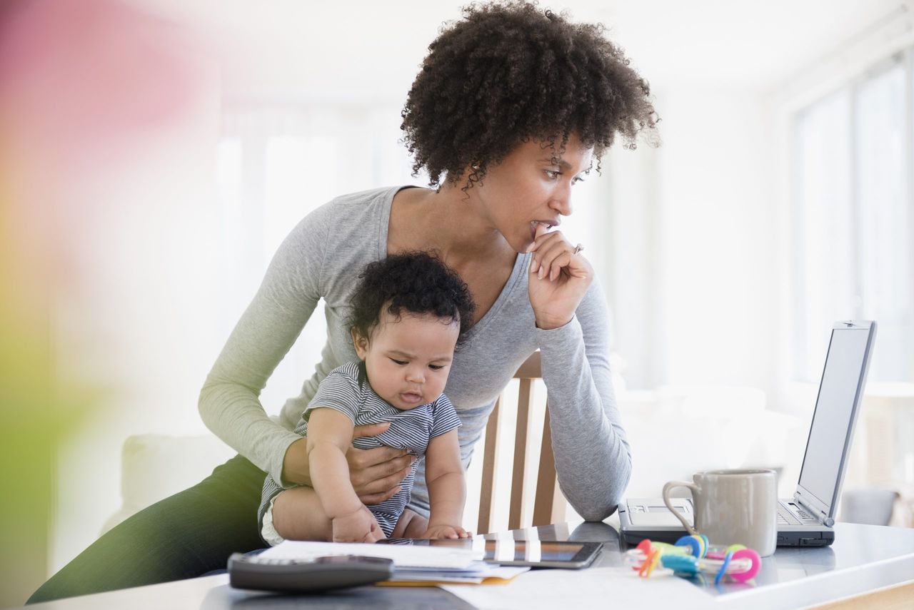 Mother and son working from home with kids