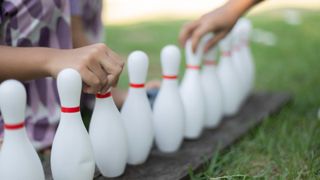 Bowling pins set up in a garden