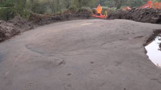 The huge stone was recently unearthed in Scotland so that archaeologists could use modern techniques to study it.