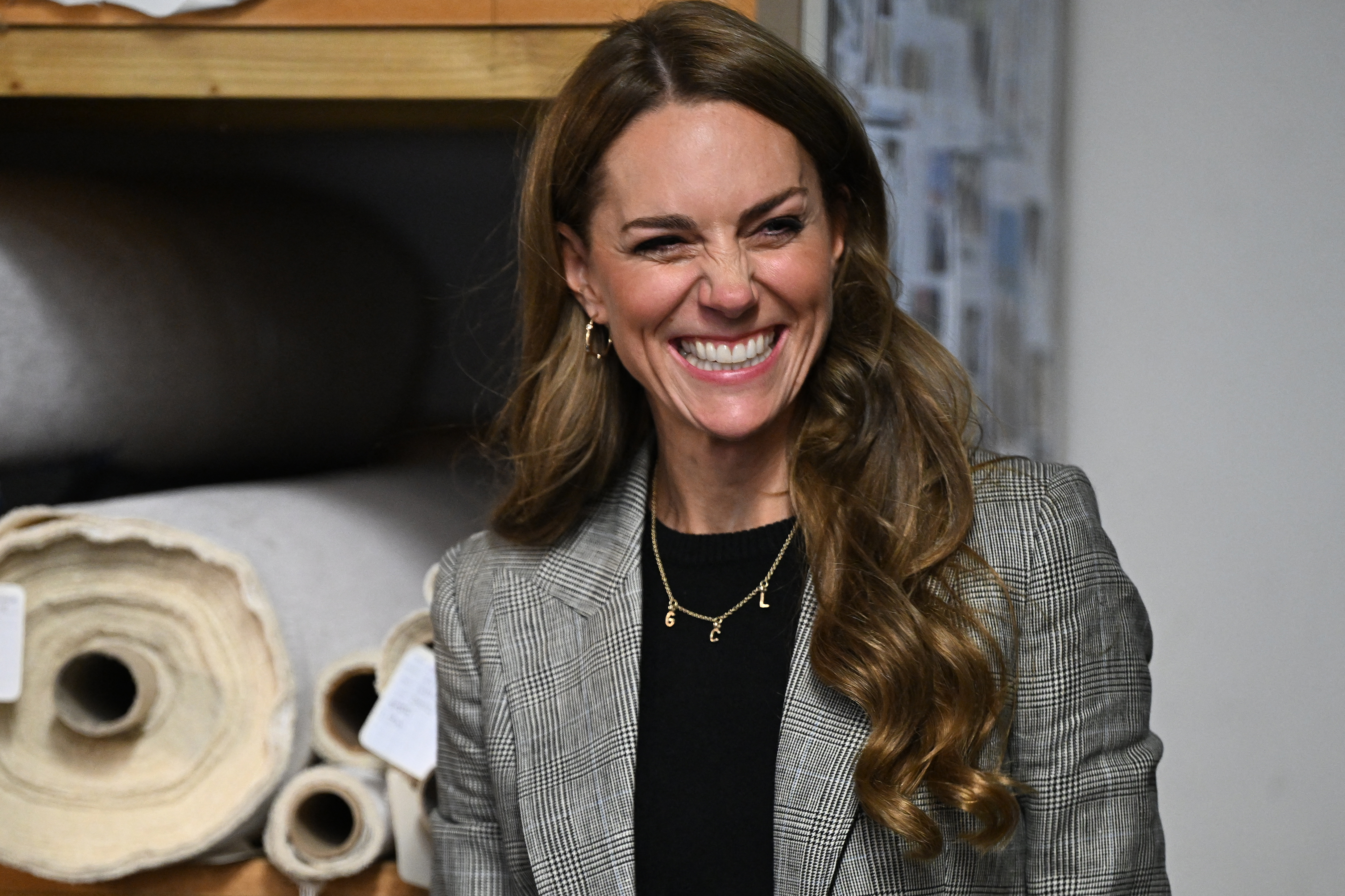 Kate Middleton attends engagement in in Sudbury wearing a plaid suit