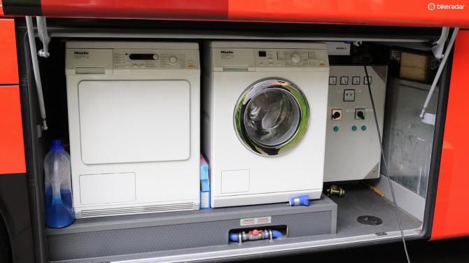 As well as the washing and drying machines on the team truck, the bus has its own, which can even be left running while driving from place to place using the built-in water supply