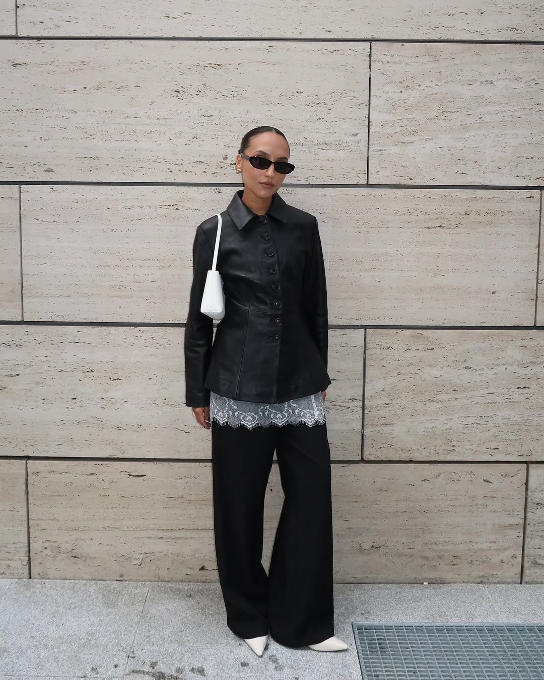 woman wearing collared leather jacket trend fall 2025
