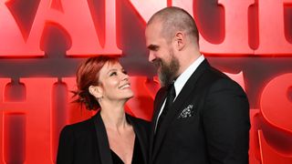 Lily Allen and US actor David Harbour pose on the red carpet upon arrival to attend the West End world premiere of "Stranger Things: The Last Shadow" stage play at the Phoenix Threatre in central London on December 14, 2023.