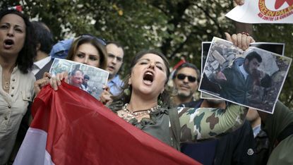 Pro-Sssad protesters demonstrate against Western military intervention in 2013