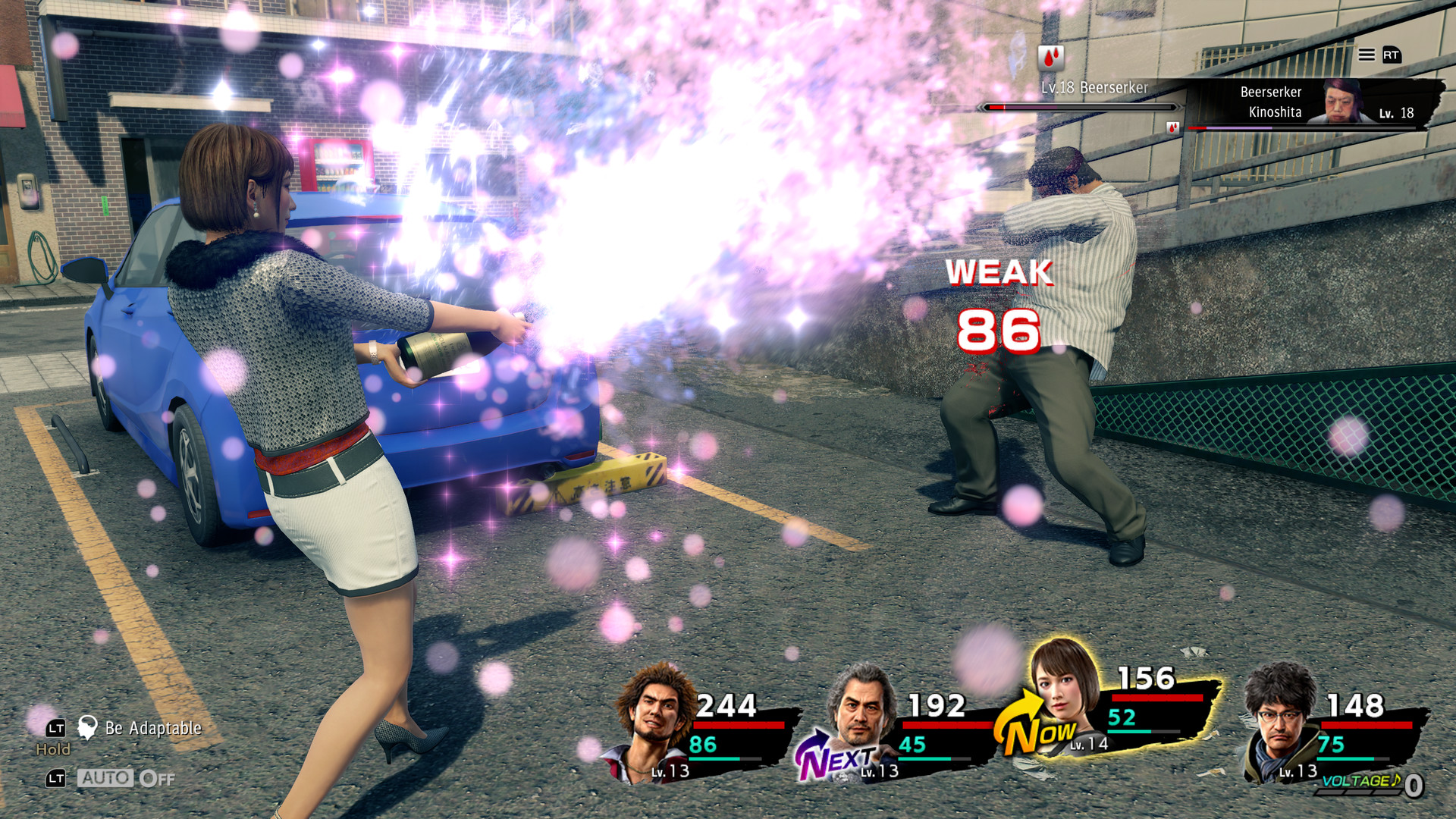 A woman spraying an attack on a thug during the RPG Yakuza: Like a Dragon