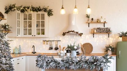a kitchen decorated for christmas
