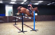 Laura Collett is back in the saddle jumping Noble Bestman at home