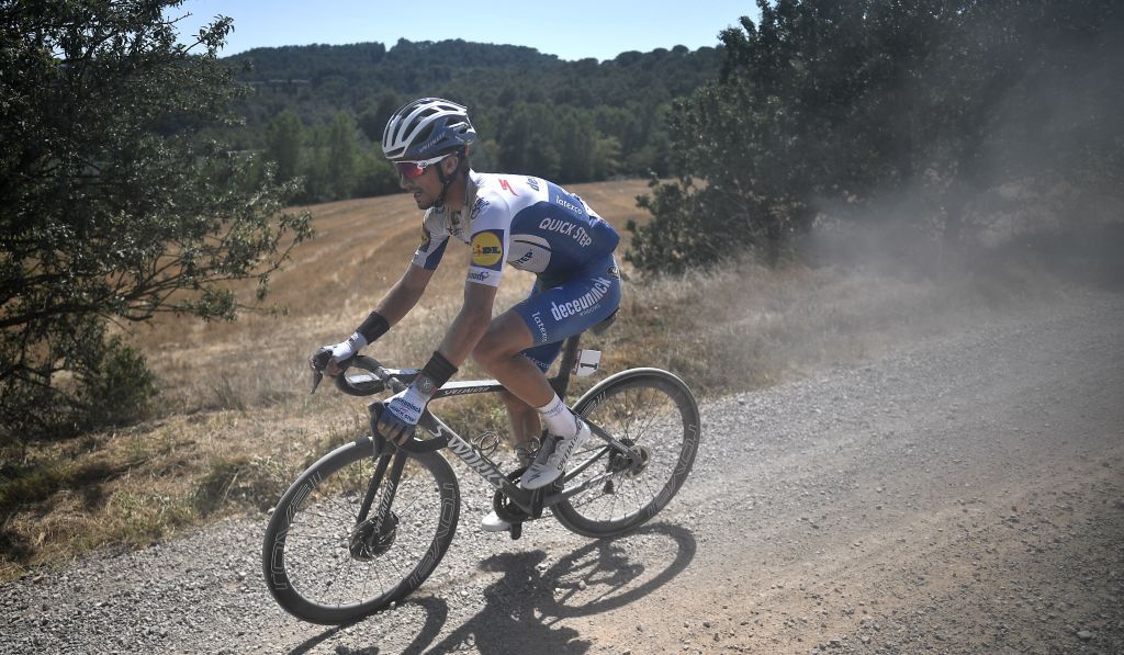 Julian Alaphilippe stop pedaling after a punctured tire during the oneday classic cycling race Strade Bianche White Roads on August 1 2020 around Siena Tuscany Photo by Marco Bertorello AFP Photo by MARCO BERTORELLOAFP via Getty Images