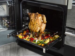 Stoves steam and infuse rack with a chicken