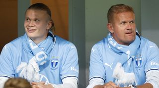 Manchester City striker Erling Haaland and his father Alf-Inge Haaland watch a match between Malmo and IFK Gothenburg in October 2024.