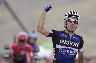 Gianluca Brambilla (Etixx-QuickStep) punches the air as he crosses the line to win stage 15