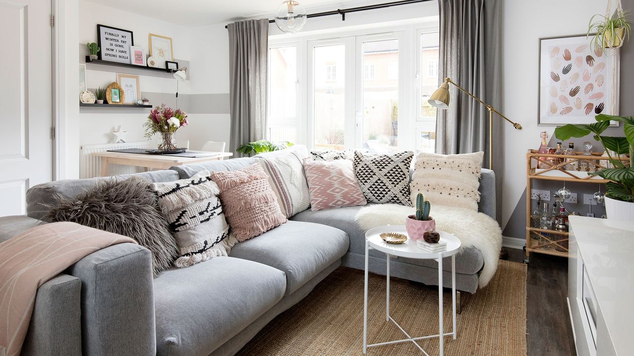 living room with sofa and curtain