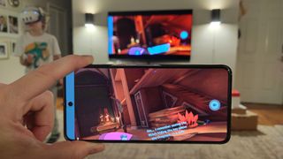 Casting gameplay from a Meta Quest 3 to a Chromecast on a TV using the Meta Quest app on a Google Pixel 8 Pro