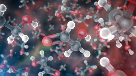 A series of black and white and red molecules floating in a colorful background