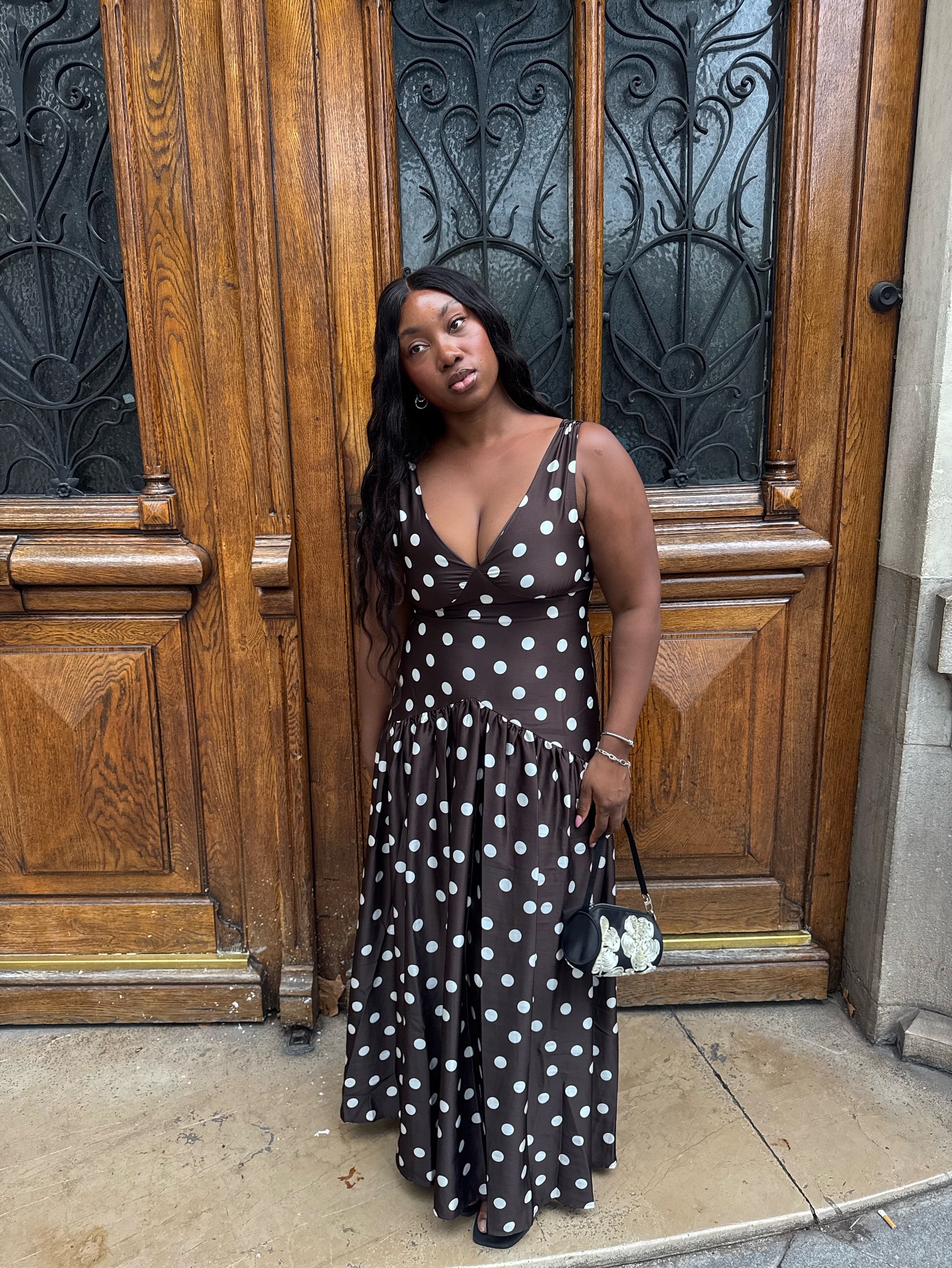 An image of @nnennaechem wearing a polka-dot dress, one of the biggest summer trends of 2026.