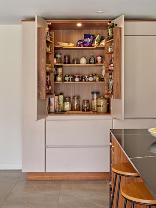 kitchen pantry with doors open