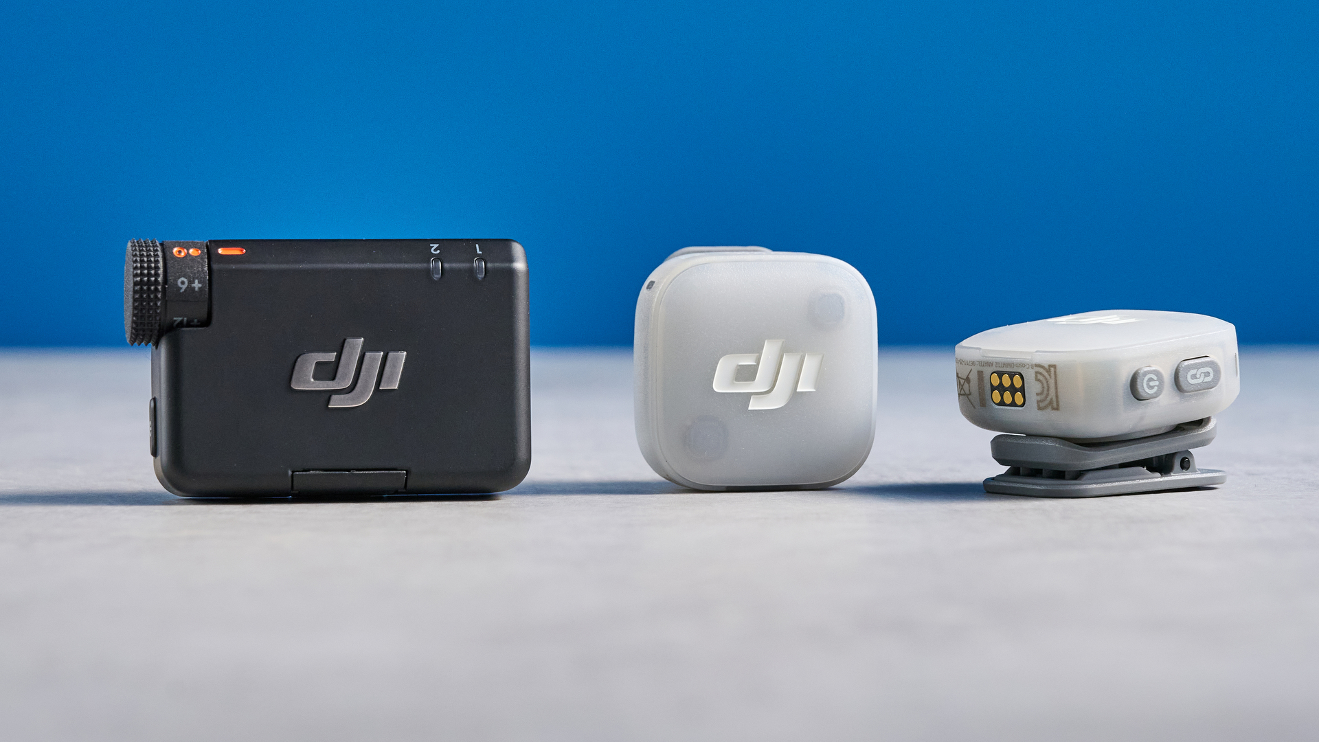 the dji mic mini 2 for camera and smartphone conent creators photographed against the blue tom's guide background