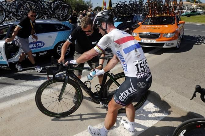 Mark Cavendish (Omega Pharma Quick Step) gets back underway after a crash.
