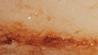 A close up view of the Andromeda Galaxy, taken from a YouTube video showcasing the achievements of the Hubble Space Telescope.