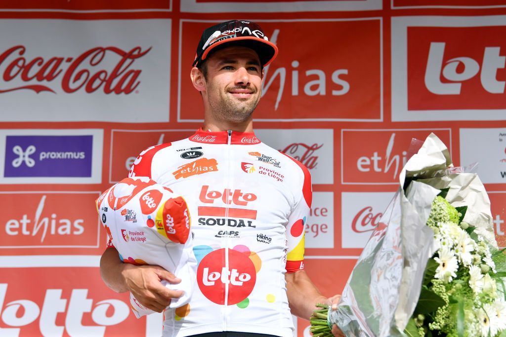 CHAPELLELEZHERLAIMONT BELGIUM JULY 27 Victor Campenaerts of Belgium and Team Lotto Soudal celebrates winning the Polka Dot Mountain Jersey on the podium ceremony after the 43rd Ethias Tour de Wallonie 2022 Stage 5 a 2148km stage from Le Roeulx to ChapellelezHerlaimont ethiastourdewallonie22 on July 27 2022 in ChapellelezHerlaimont Belgium Photo by Luc ClaessenGetty Images