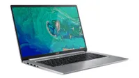 Acer Swift 5 lightweight laptop shown in silver colorway on white background. The screen is open at 95.6 degrees and facing the viewer, displaying an image of the Earth taken from a satellite. Water, land and clouds are shown.