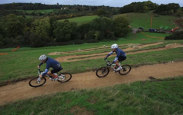 Paul Beales and Billy-Joe Whenman of Great Britain rides the London 2012 Olympic Mountain Bike venue at Hadleigh Farm