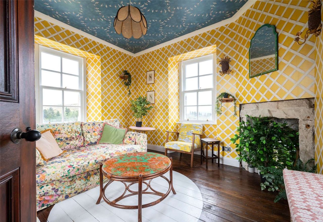 A yellow painted room within the castle