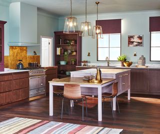 split level kitchen island with lower area dedicated to seating