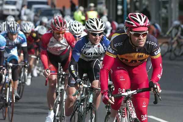 Tour leader Rhys Pollock (Drapac Porsche) leads the peloton along the streets of Burnie's CBD.
