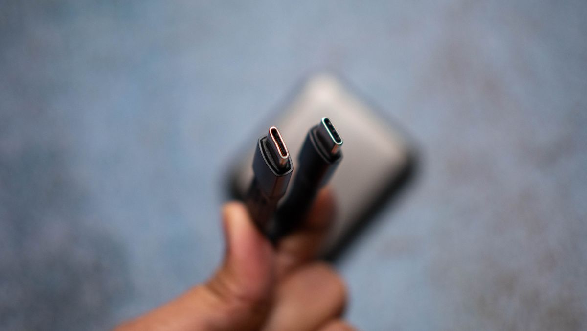 TeamGroup PD20M MagSafe SSD design photos against a craft sheet