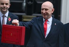 British Chancellor John Healey leaves Downing Street to present 2026 Autumn Budget