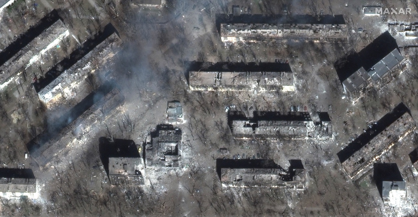 This photo, captured by Maxar Technologies’ WorldView-3 satellite on March 29, 2022, shows the destruction of residential apartment buildings in the Ukrainian city of Mariupol by Russian shelling.