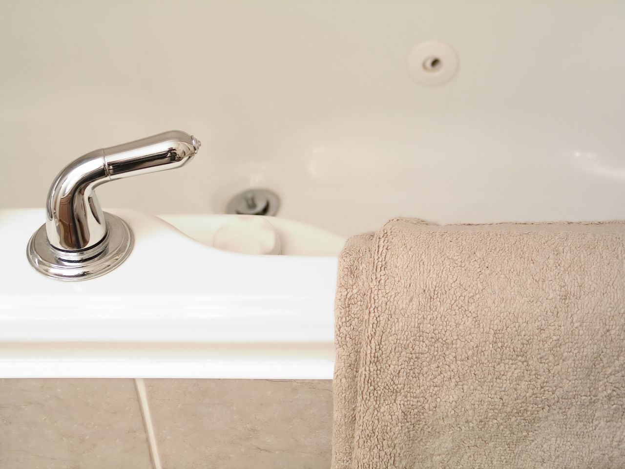 How to clean a bathtub the best ways to tackle stains, the bath drain